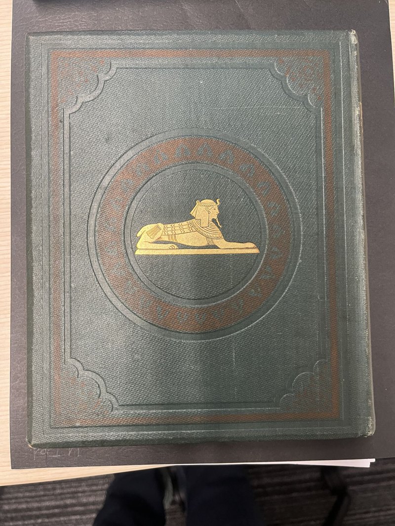 Original green cloth rear board with gilt sphinx and brown-stamped decoration