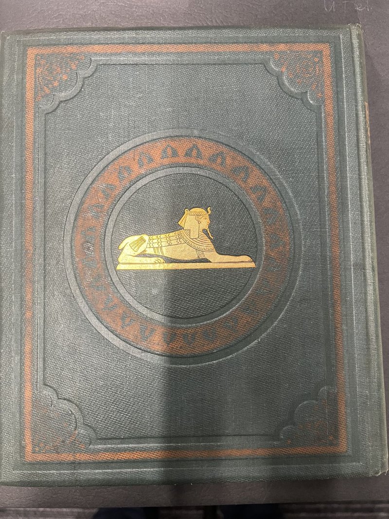 Original green cloth rear board with gilt sphinx and brown-stamped decoration