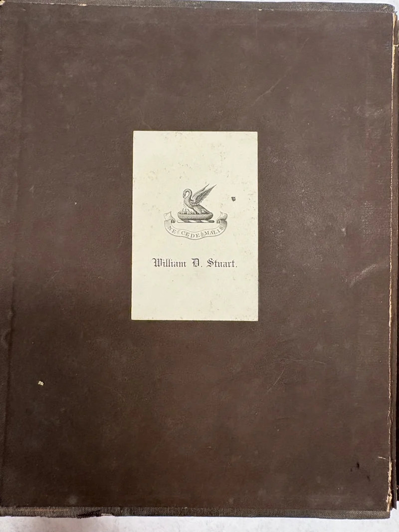 S067: William D. Stuart bookplate with motto “NE CEDE MALIS”