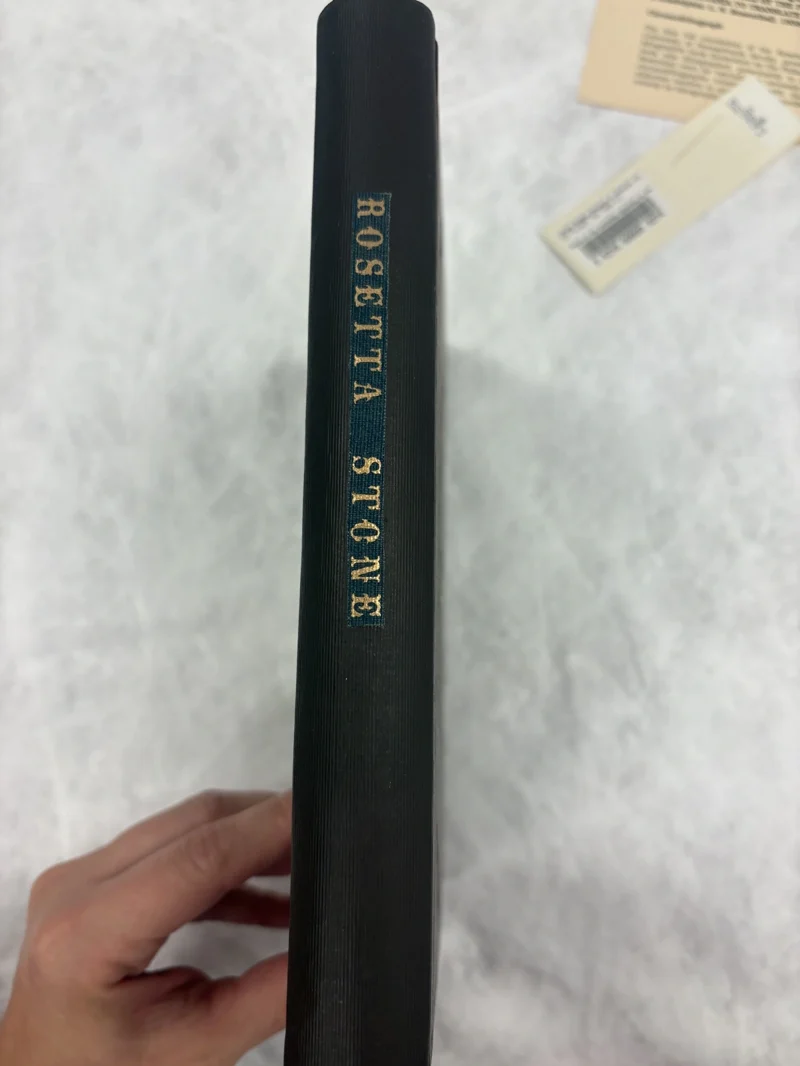 S067: Later cloth spine retaining gilt “ROSETTA STONE” title lettering
