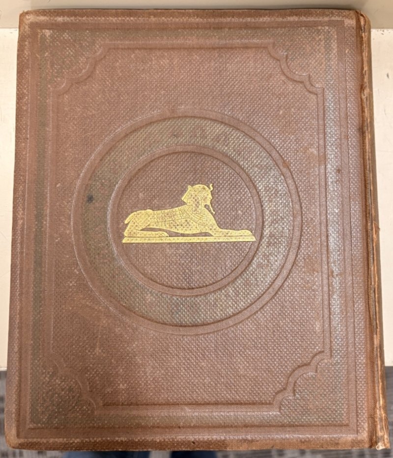 Rear board with gilt sphinx and blind-stamped decoration
