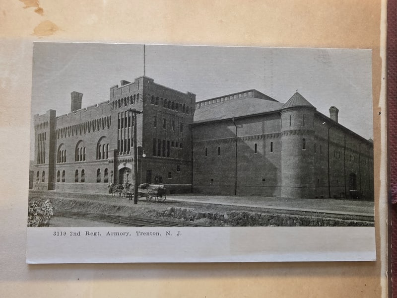 Laid-in postcard of the 2nd Regt. Armory, Trenton, N.J.