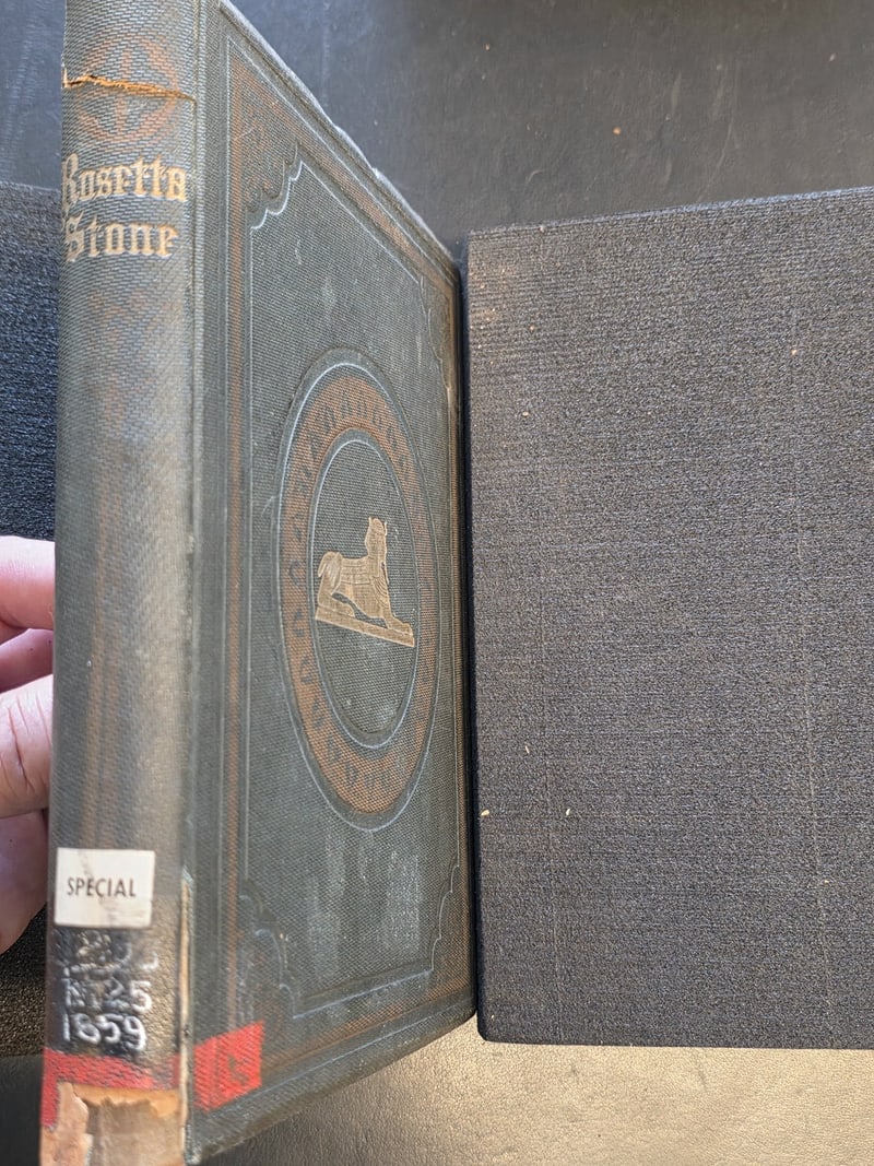 Spine of the original green cloth