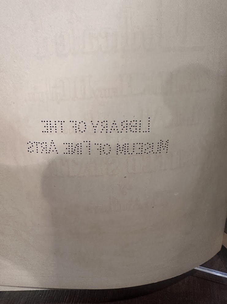 Perforated stamp: Library of the Museum of Fine Arts