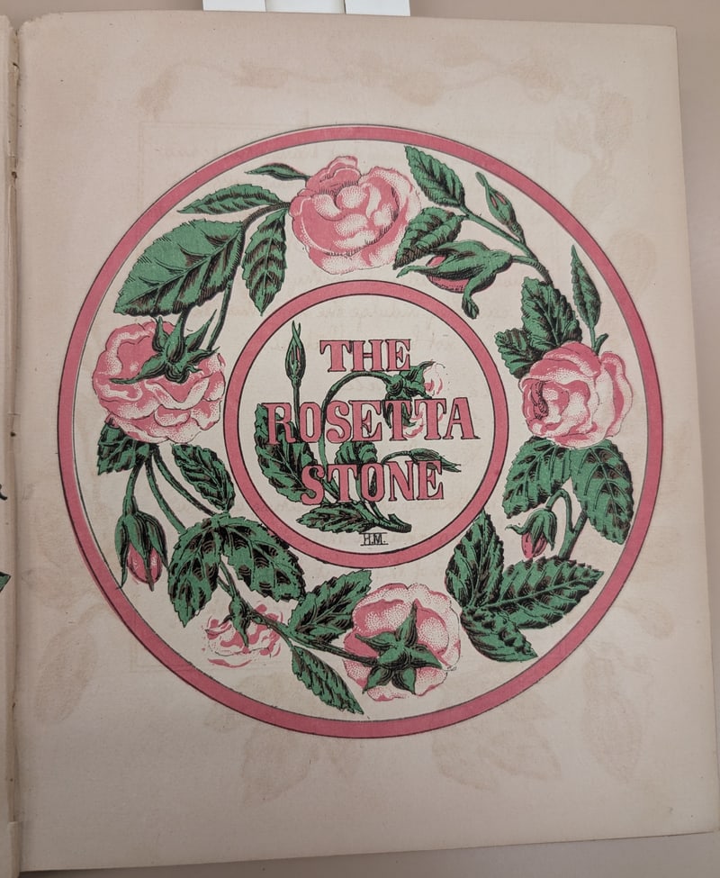 “The Rosetta Stone” rose roundel with the initials H.M.