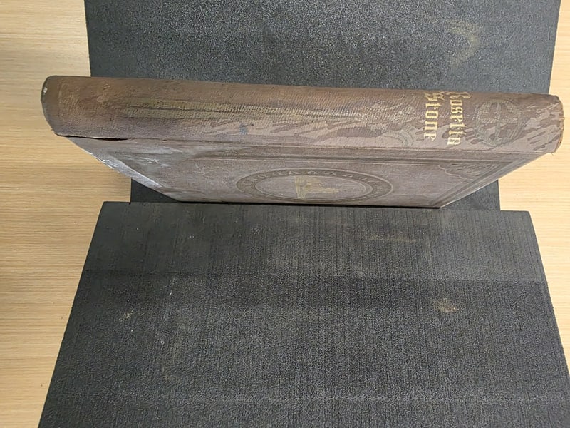 Spine with gilt Rosetta Stone title
