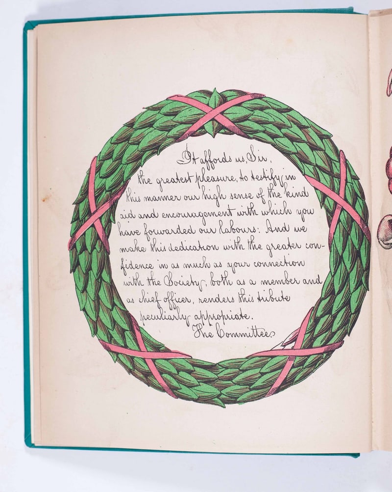 Text leaf within a green wreath